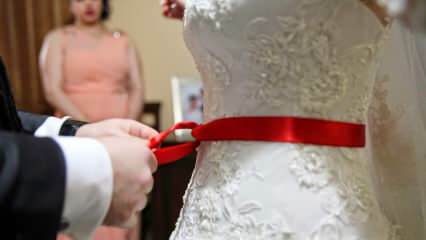 Ποια είναι η σημασία της κόκκινης κορδέλας; Γιατί η κόκκινη ζώνη είναι δεμένη με τη νύφη;