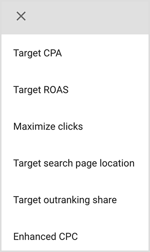 Αυτό είναι ένα στιγμιότυπο οθόνης ενός μενού επιλογών στόχευσης στο Google Ads. Οι επιλογές είναι CPA-στόχος, Στόχος απόδοσης διαφημιστικής επένδυσης, Μεγιστοποίηση κλικ, Στόχευση τοποθεσίας σελίδας αναζήτησης, Στόχος μεριδίου υψηλότερης κατάταξης, Ενισχυμένο CPC. Ο Mike Rhodes λέει ότι οι έξυπνες επιλογές στόχευσης στο Google Ads χρησιμοποιούν τεχνητή νοημοσύνη για να βρουν άτομα με τη σωστή πρόθεση για τη διαφήμισή σας.